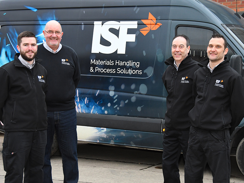 ISF team stood with ISF branded van
