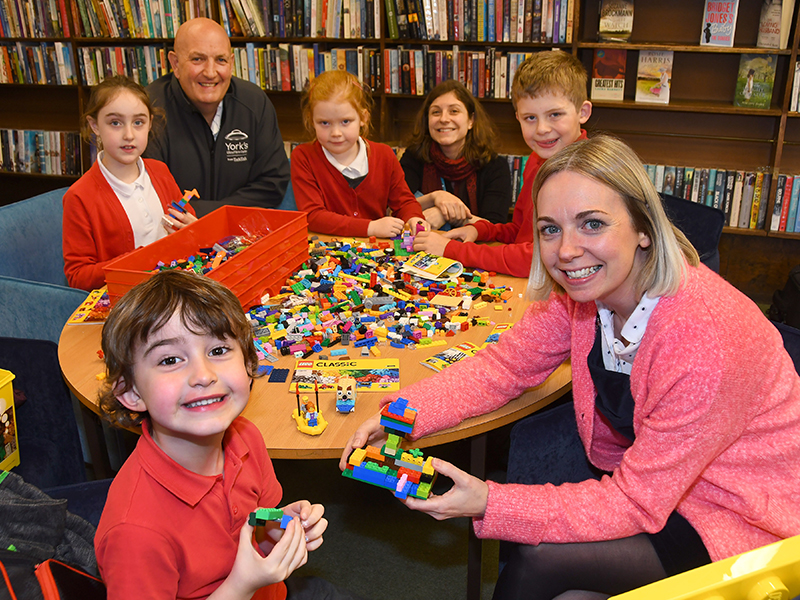 TalkTalk team with children at library playing with LEGO