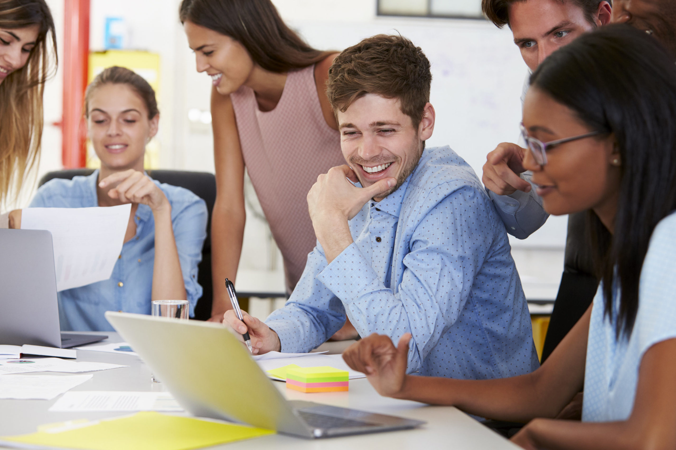 Colleagues-working-together-in-a-busy-office
